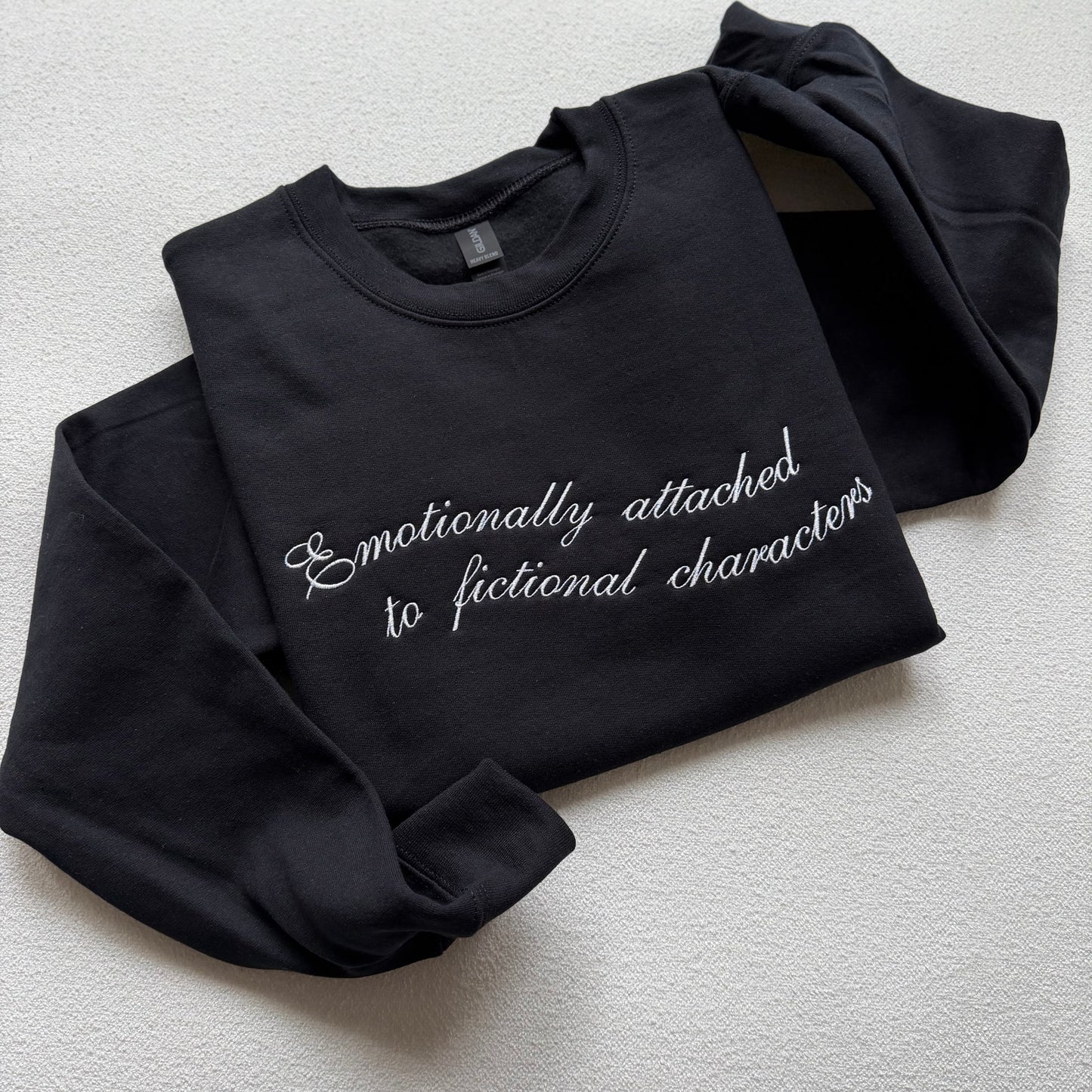 Emotionally Attached to Fictional Characters — Embroidered Gildan Crewneck
