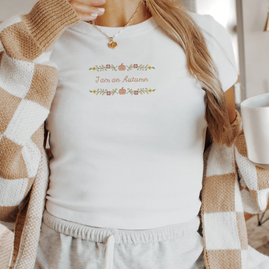 I am an Autumn — Embroidered Bella + Canvas Baby Tee