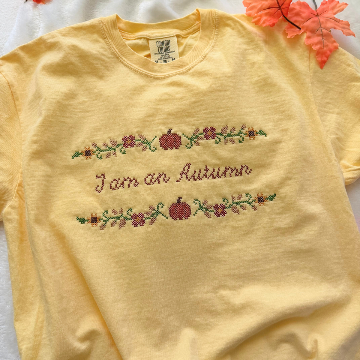 I am an Autumn — Embroidered Comfort Colors Cropped Tee