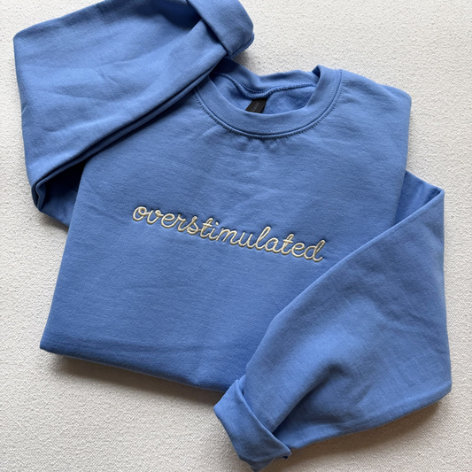 Overstimulated — Embroidered Gildan Sweatshirt